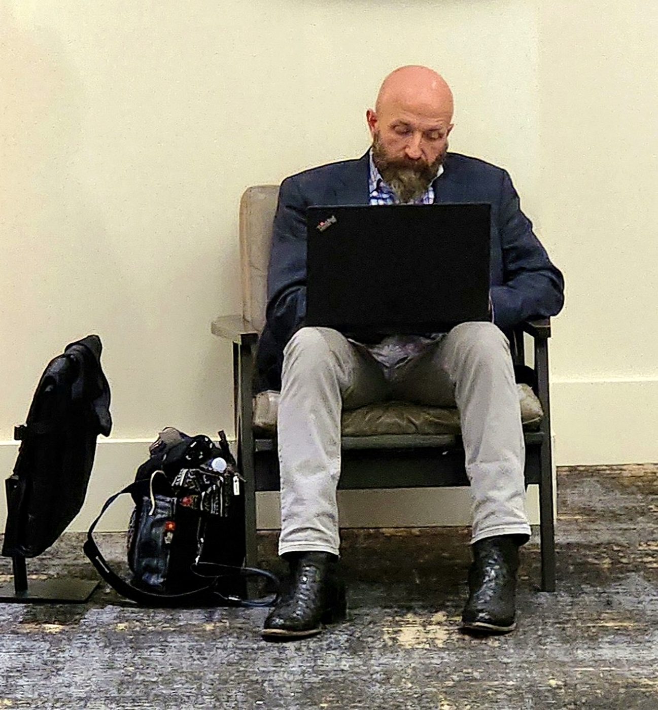 Russ working on a laptop